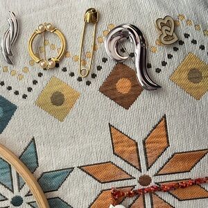 Assorted MONET Silver and Gold Brooch Pieces. 5 in collection.